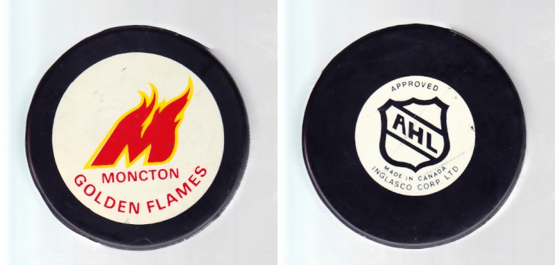 1986-93 AHL IN GLAS CO MONCTON GOLDEN FLAMES GAME PUCK photo