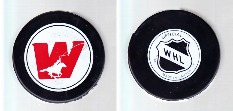 1983-86 WHL GDR CALGARY WRANGLERS GAME PUCK photo