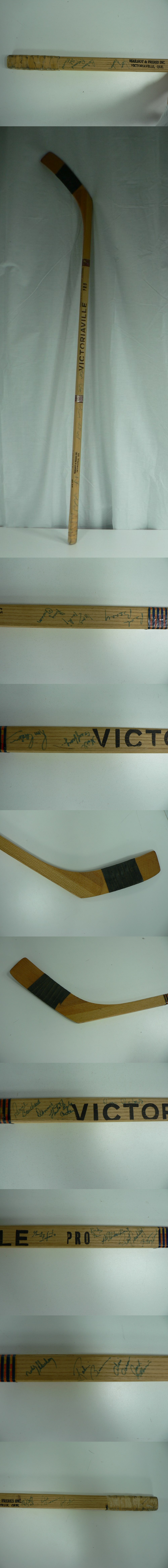 1970'S ST. LOUIS BLUES P. ROBERTO GAME USED STICK TEAM AUTOGAPHED BY 24 photo