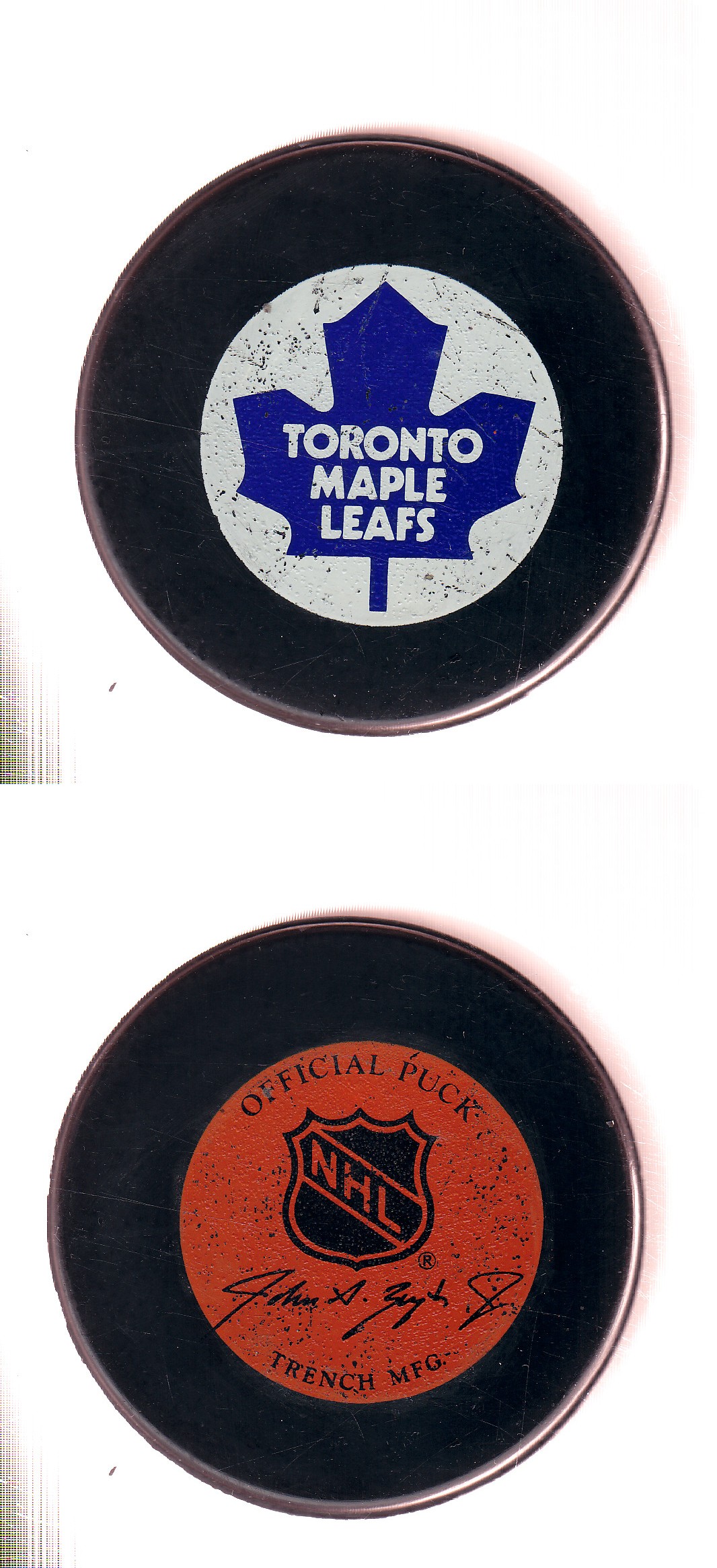 1982-92 GT1 (WITH OFFICIAL) TORONTO MAPLE LEAFS GAME PUCK photo