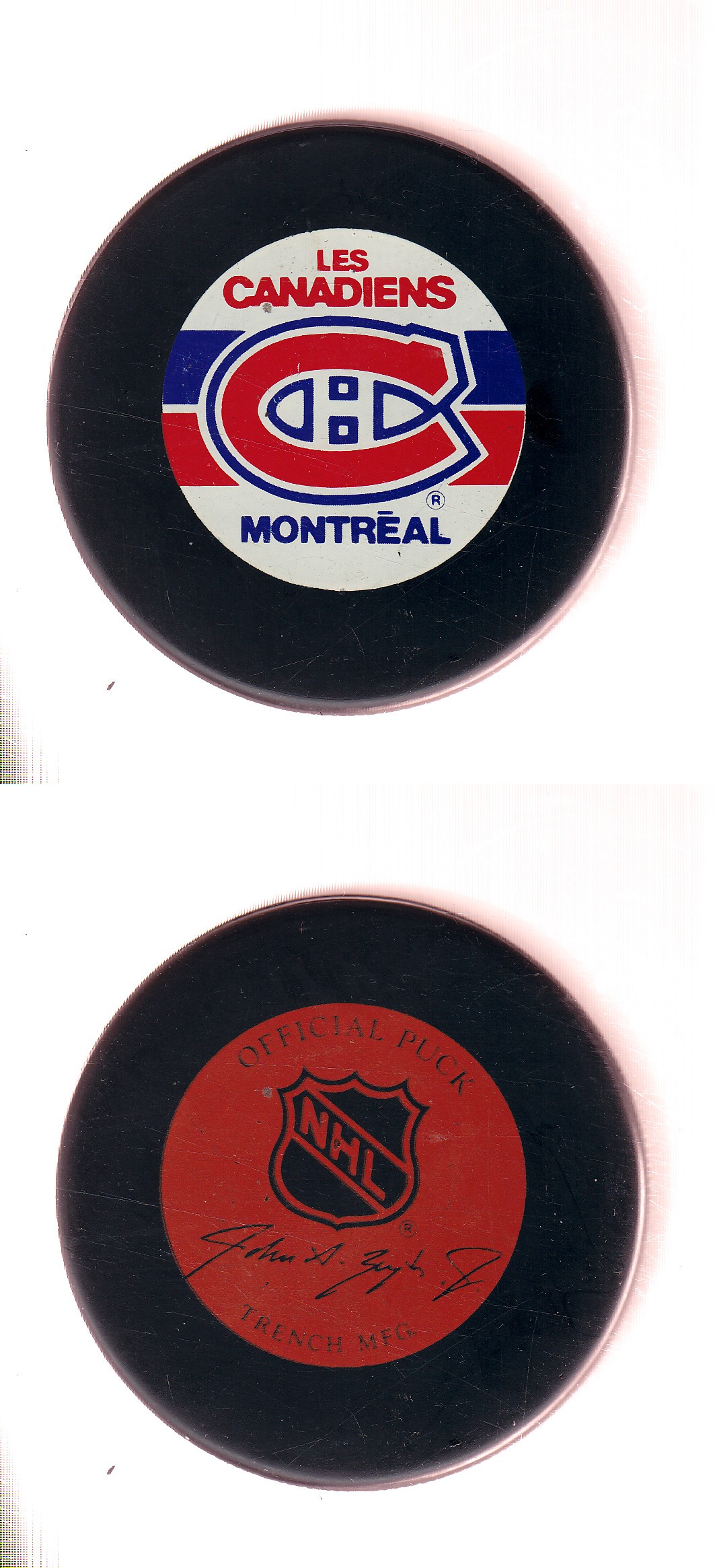 1982-92 GT1 (WITH OFFICIAL) MONTREAL CANADIENS GAME PUCK photo