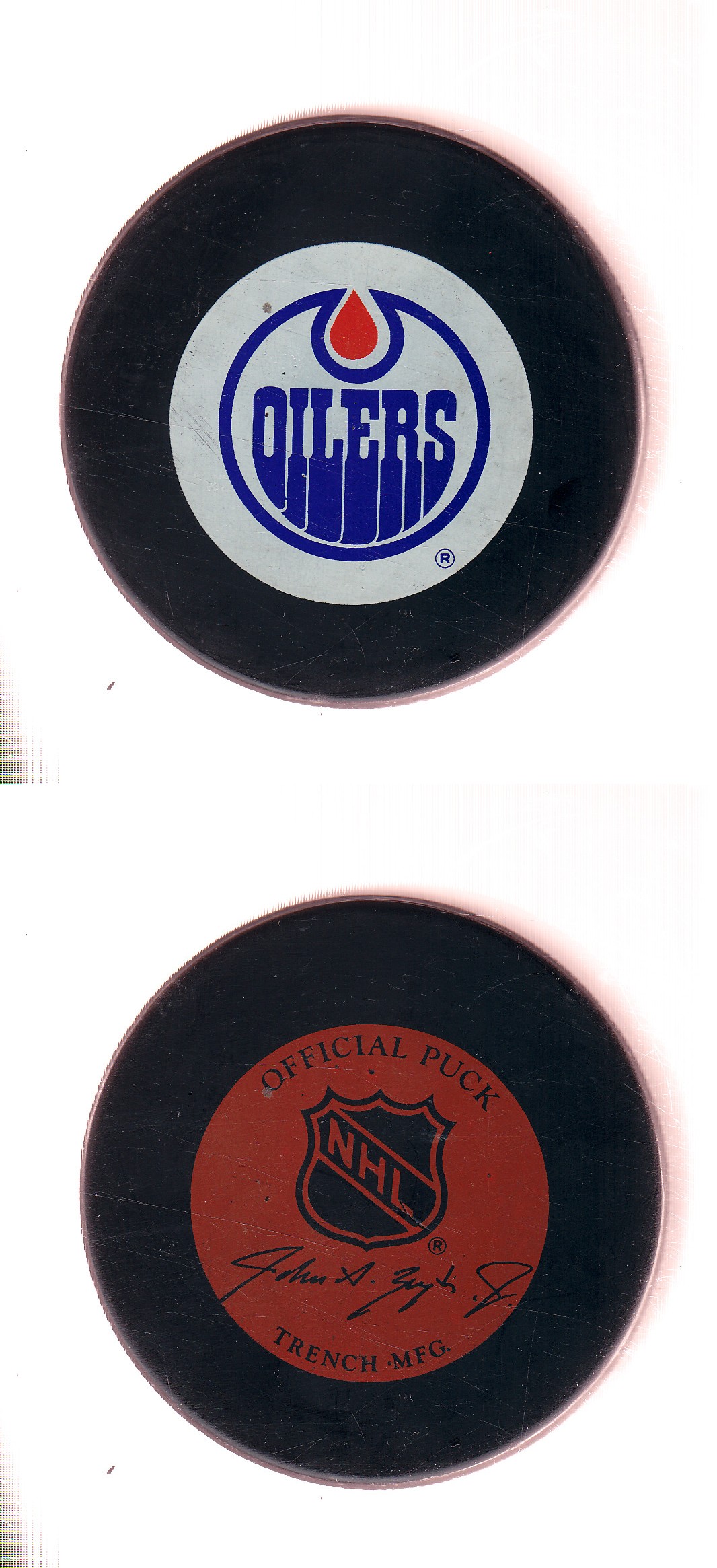 1982-92 GT1 (WITH OFFICIAL) EDMONTON OILERS GAME PUCK photo