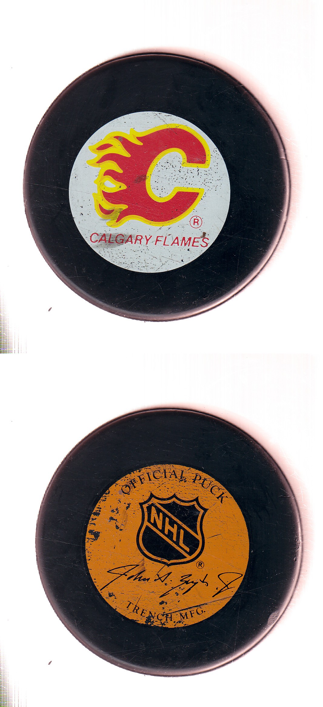 1982-92 GT1 (WITH OFFICIAL) CALGARY FLAMES GAME PUCK photo
