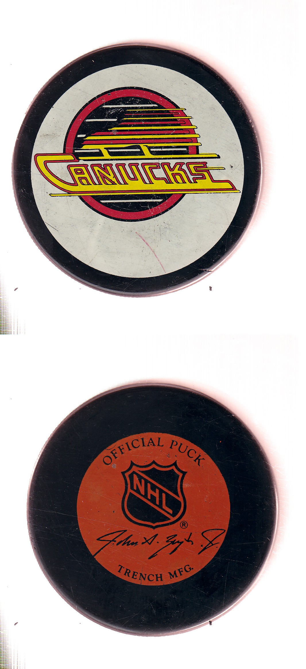 1982-92 GT1 (WITH OFFICIAL) VANCOUVER CANUCKS GAME PUCK photo