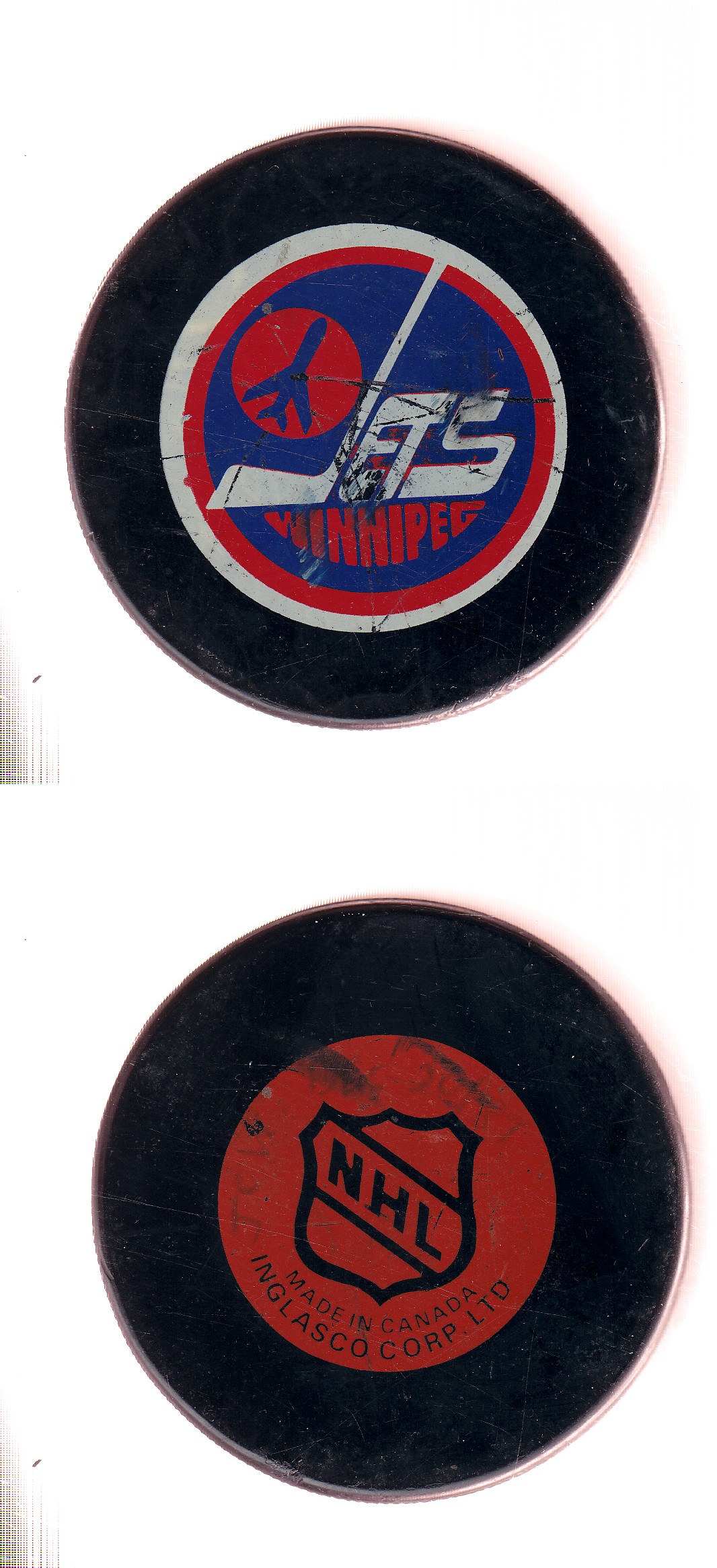 1985-92 IN GLAS CO WINNIPEG JETS GAME PUCK photo
