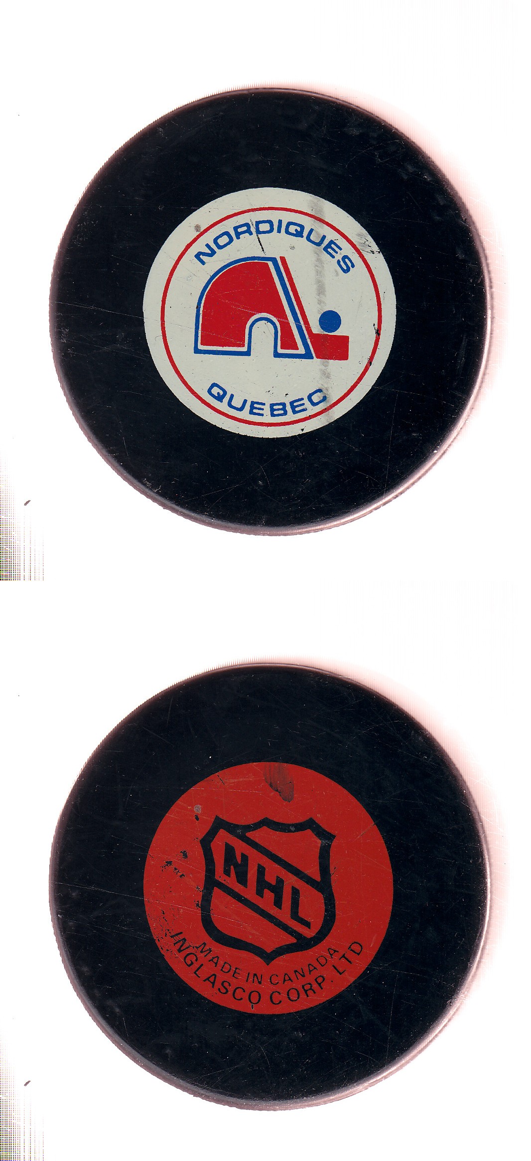 1985-92 IN GLAS CO QUEBEC NORDIQUES GAME PUCK photo
