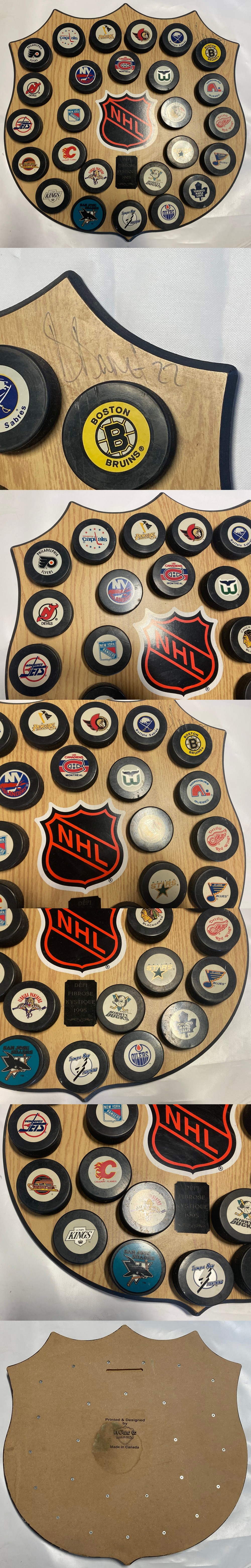 1995 NHL PUCKS DISPLAY 26 AUTOGRAPHED BY P. STASTNY photo